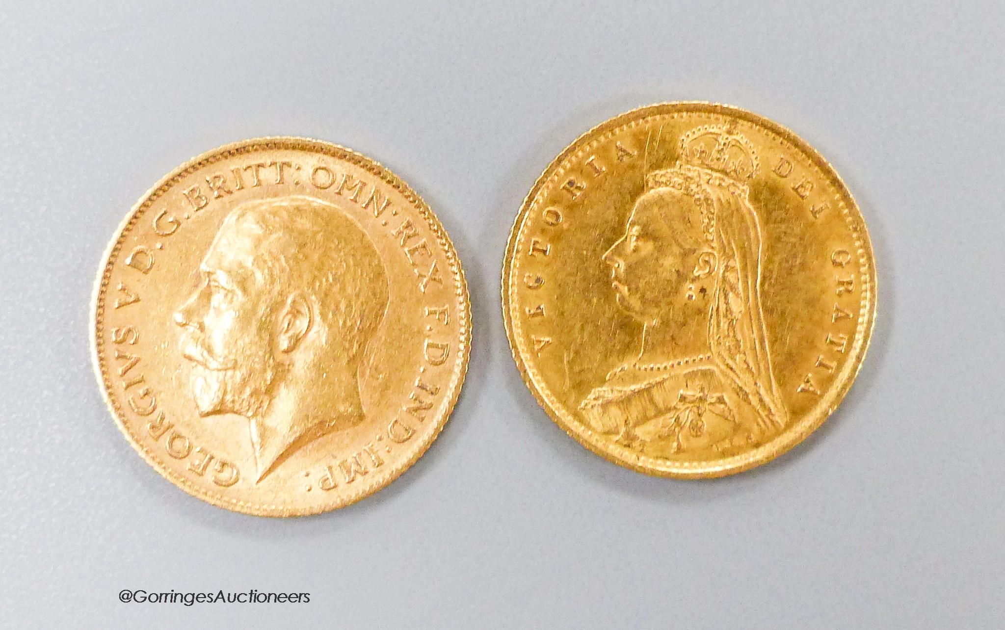 A Victoria gold half sovereign, 1887 and a George V 1912 gold half sovereign.